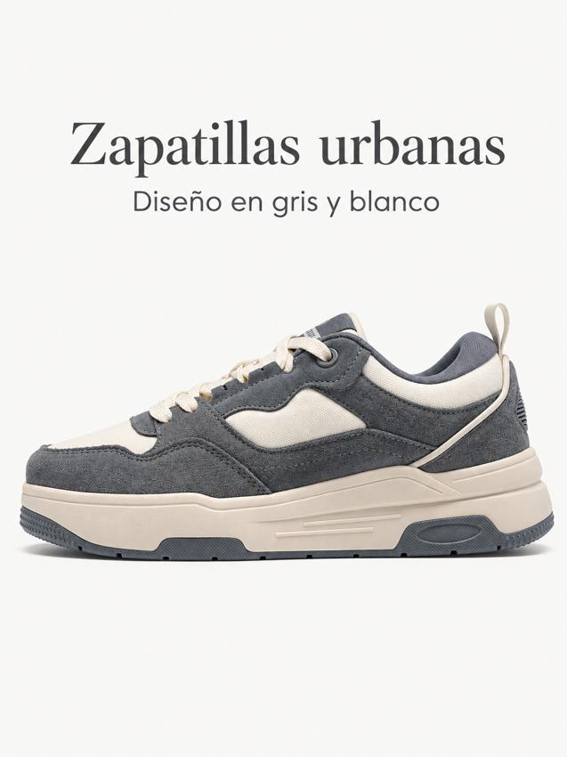 Zapatillas de cuero gris y blanco para mujer